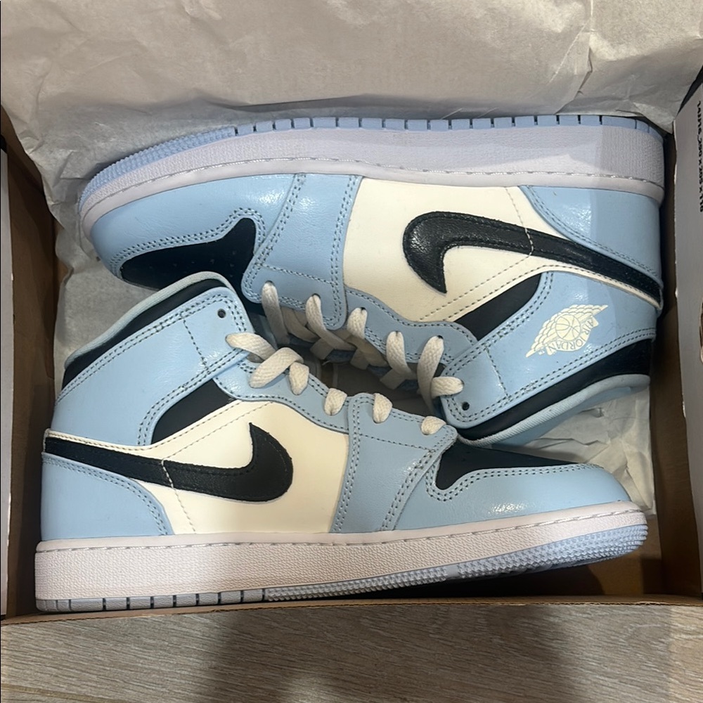 Nike Air Jordan 1 Mid Blue and Black Sneakers